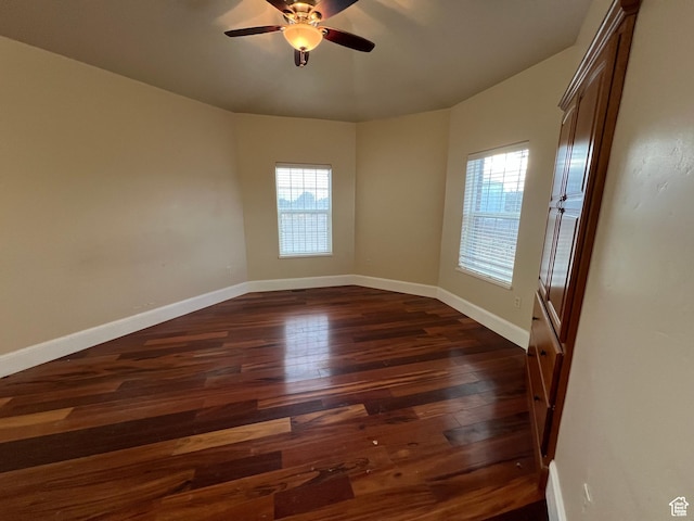 5867 W 4000 N, Roosevelt, UT 84066 - spare room featuring a wealth of natural light, ceiling fan, dark wood finished floors, and baseboards