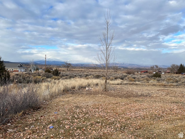 5867 W 4000 N, Roosevelt, UT 84066 - property view of mountains featuring a rural view
