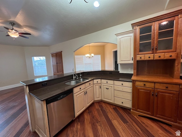 5867 W 4000 N, Roosevelt, UT 84066 - kitchen with a sink, dark wood-type flooring, a peninsula, stainless steel dishwasher, and arched walkways
