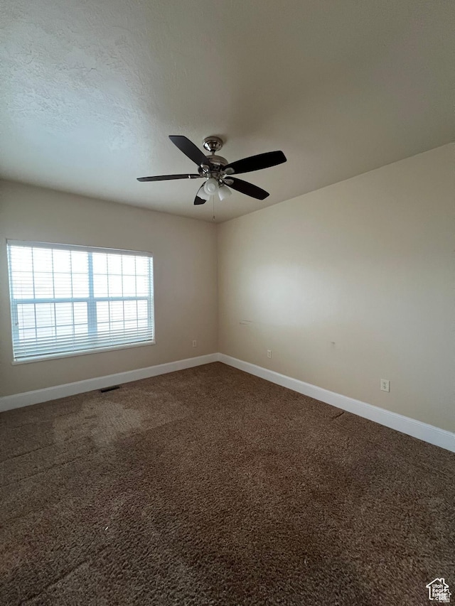 5867 W 4000 N, Roosevelt, UT 84066 - carpeted empty room featuring visible vents, ceiling fan, and baseboards
