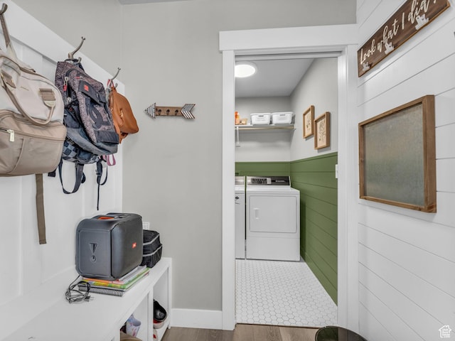 13952 S Indian Ln E, Herriman, UT 84096 - washroom with washer and dryer and wood finished floors