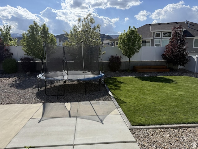 13952 S Indian Ln E, Herriman, UT 84096 - view of yard featuring a trampoline