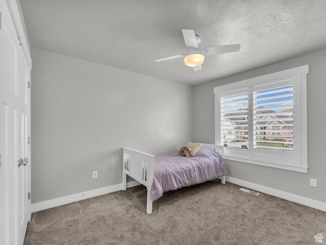 13952 S Indian Ln E, Herriman, UT 84096 - carpeted bedroom featuring baseboards and a ceiling fan