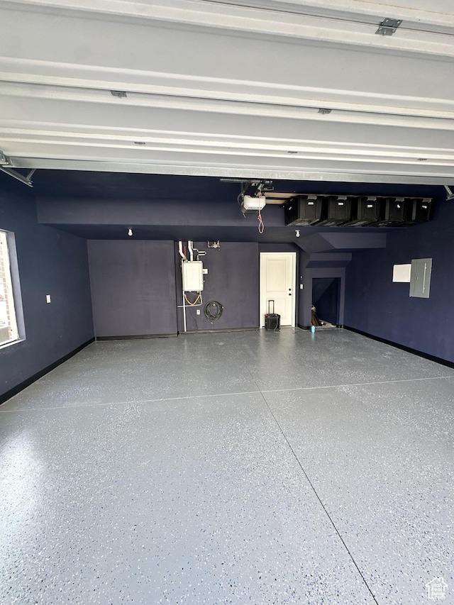 12975 S Spook Gulch Ct Unit 621, Riverton, UT 84096 - garage with baseboards and a garage door opener