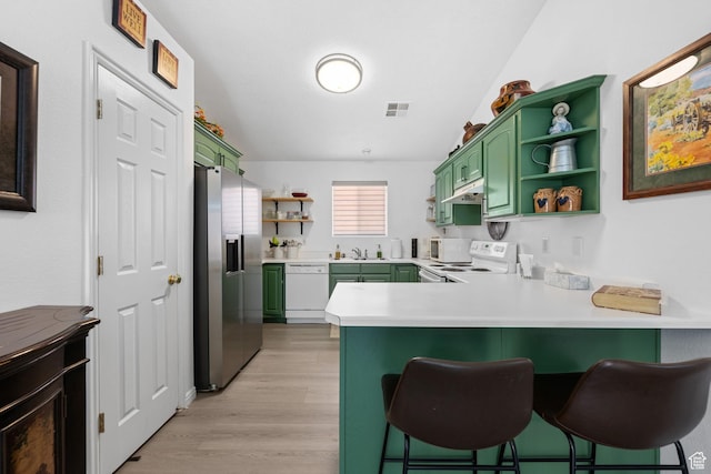 2369 S 780 W, Hurricane, UT 84737 - kitchen with green cabinetry, white appliances, open shelves, and a peninsula