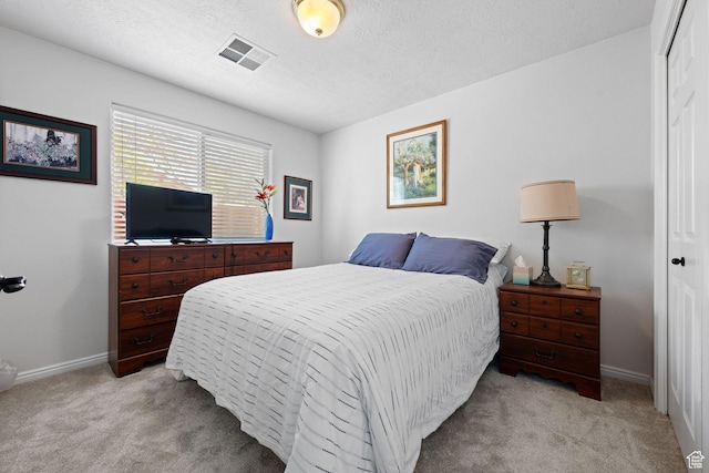 2369 S 780 W, Hurricane, UT 84737 - bedroom with baseboards, visible vents, and light colored carpet