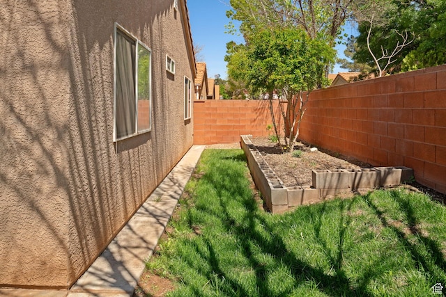 2369 S 780 W, Hurricane, UT 84737 - view of yard featuring a fenced backyard and a garden