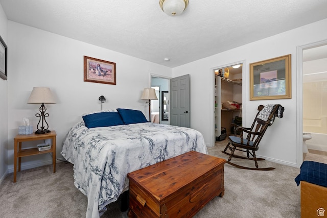 2369 S 780 W, Hurricane, UT 84737 - bedroom featuring a closet, baseboards, light colored carpet, and a spacious closet
