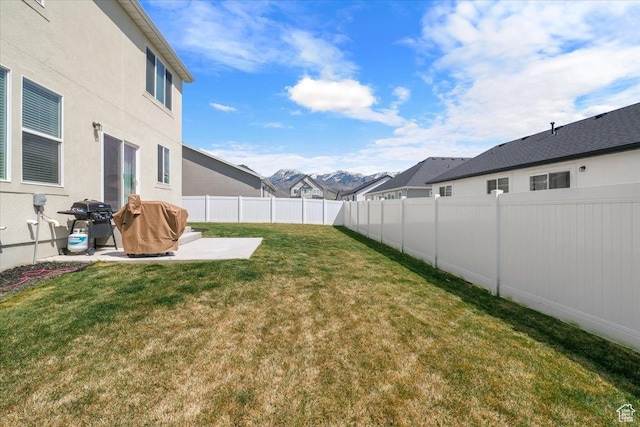 574 W 500 N, Smithfield, UT 84335 - view of yard featuring a fenced backyard, a residential view, and a patio area