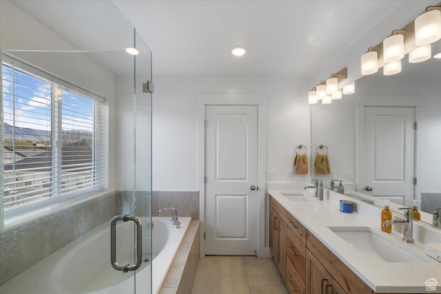 574 W 500 N, Smithfield, UT 84335 - bathroom with tile patterned flooring, a bath, double vanity, and a sink