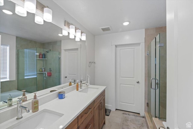574 W 500 N, Smithfield, UT 84335 - bathroom with visible vents, a shower stall, and a sink