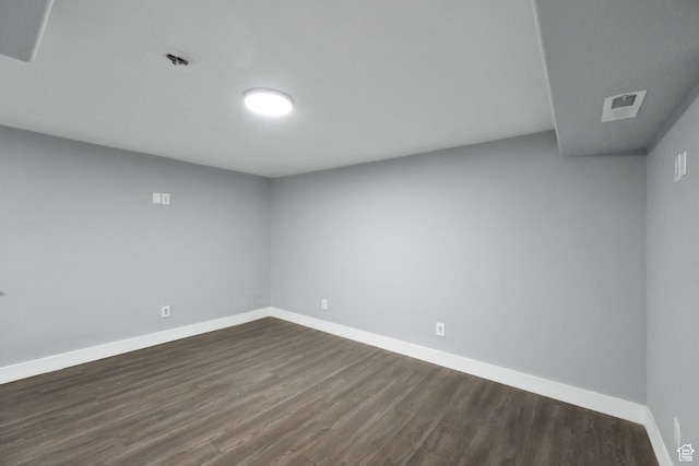 5103 W S Jordan Pkwy, South Jordan, UT 84009 - basement with dark wood-type flooring, visible vents, and baseboards