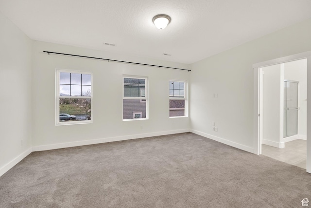 5103 W S Jordan Pkwy, South Jordan, UT 84009 - unfurnished room with carpet, visible vents, and baseboards