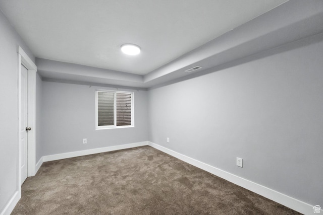 5103 W S Jordan Pkwy, South Jordan, UT 84009 - unfurnished room with visible vents, dark carpet, and baseboards
