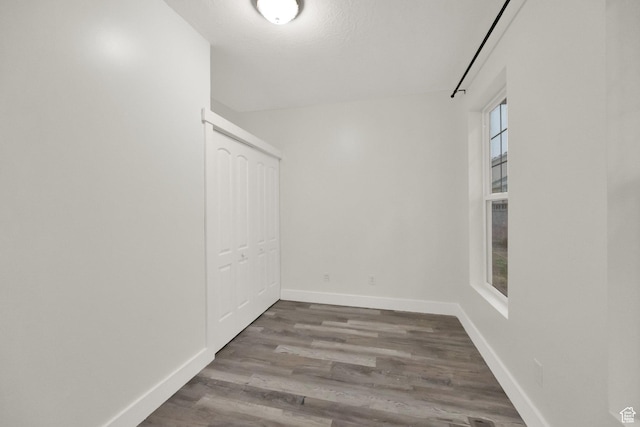 5103 W S Jordan Pkwy, South Jordan, UT 84009 - unfurnished room with dark wood-style flooring and baseboards