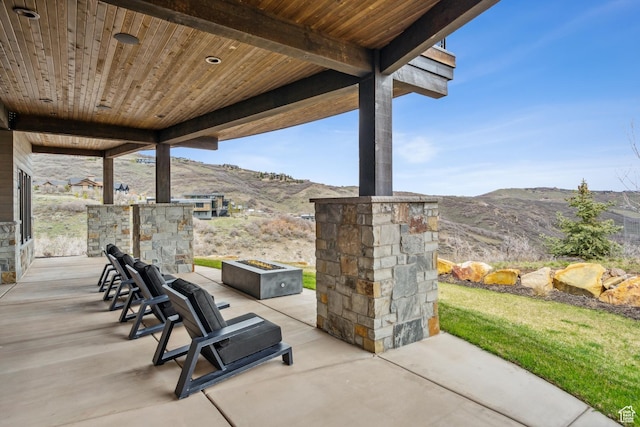 4014 Aspen Camp Loop, Park City, UT 84098 - view of patio / terrace featuring a fire pit and a mountain view
