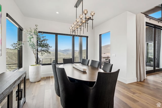 4014 Aspen Camp Loop, Park City, UT 84098 - dining area featuring a mountain view, wood finished floors, and baseboards