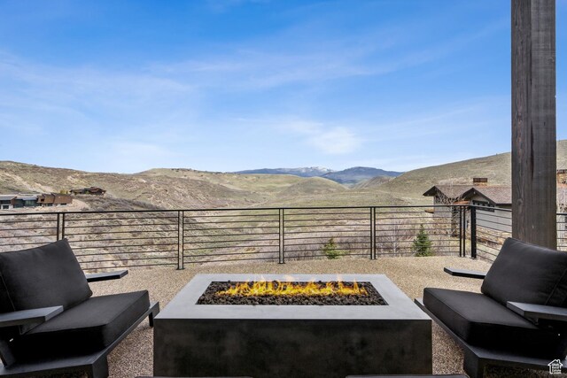 4014 Aspen Camp Loop, Park City, UT 84098 - view of patio with an outdoor living space with a fire pit, a mountain view, and fence private yard