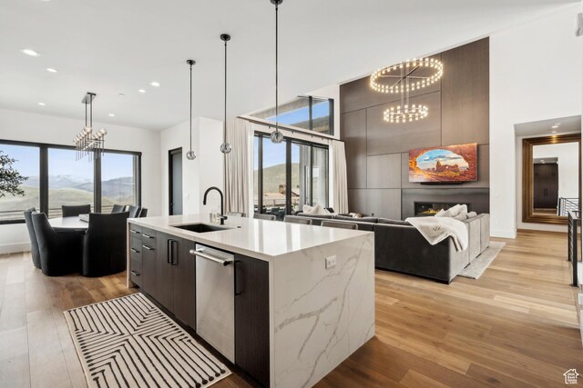 4014 Aspen Camp Loop, Park City, UT 84098 - kitchen with recessed lighting, a sink, modern cabinets, light wood-style floors, and a notable chandelier
