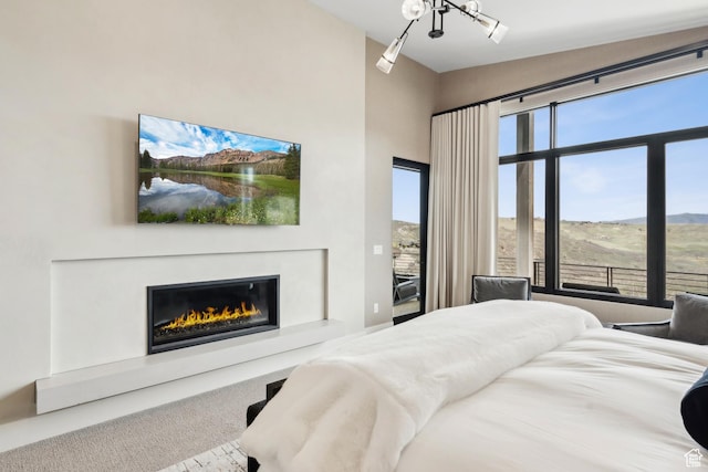4014 Aspen Camp Loop, Park City, UT 84098 - carpeted bedroom featuring a glass covered fireplace