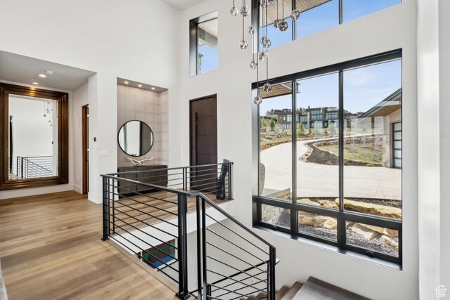 4014 Aspen Camp Loop, Park City, UT 84098 - stairs with baseboards, wood finished floors, and a towering ceiling
