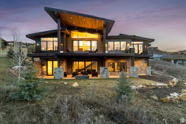 4014 Aspen Camp Loop, Park City, UT 84098 - back of house with a patio, a balcony, and stone siding