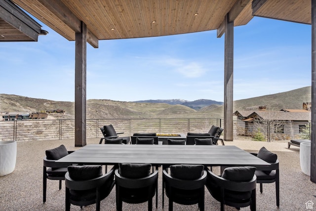 4014 Aspen Camp Loop, Park City, UT 84098 - view of patio / terrace featuring a mountain view, a fenced backyard, and outdoor dining area