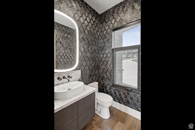 4014 Aspen Camp Loop, Park City, UT 84098 - bathroom with wood finished floors, toilet, vanity, and tile walls