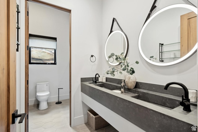 4014 Aspen Camp Loop, Park City, UT 84098 - bathroom with toilet, tile patterned flooring, vanity, and baseboards