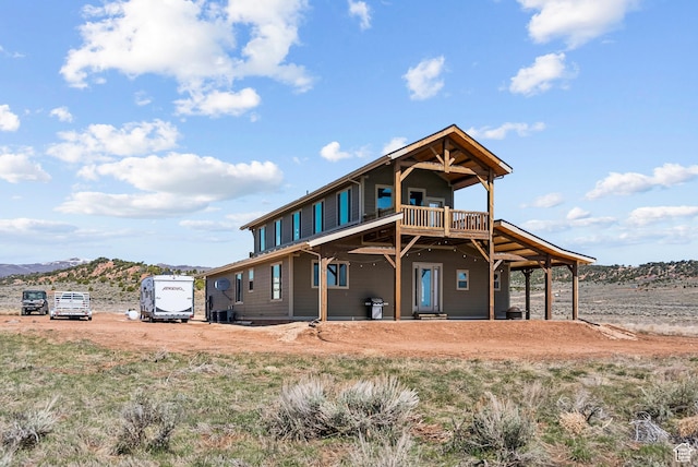 46997 W Thunder Ridge Rd, Fruitland, UT 84027 - back of house featuring a mountain view and a balcony