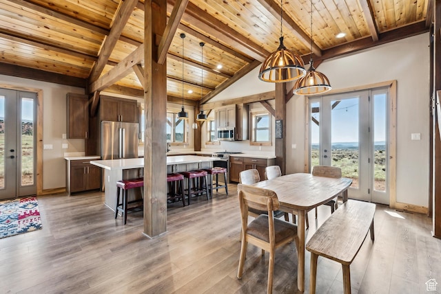 46997 W Thunder Ridge Rd, Fruitland, UT 84027 - dining space with french doors, a healthy amount of sunlight, and wooden ceiling