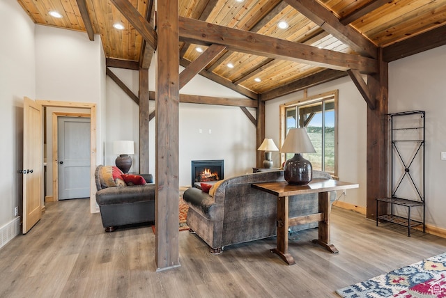 46997 W Thunder Ridge Rd, Fruitland, UT 84027 - interior space with wood ceiling, beamed ceiling, a warm lit fireplace, light wood-type flooring, and recessed lighting