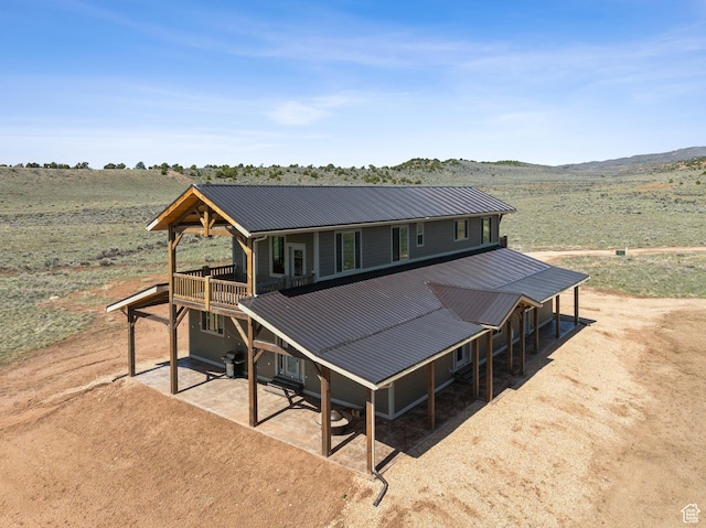 46997 W Thunder Ridge Rd, Fruitland, UT 84027 - back of house with a rural view and metal roof