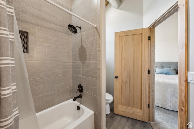 46997 W Thunder Ridge Rd, Fruitland, UT 84027 - ensuite bathroom featuring shower / tub combo, toilet, connected bathroom, and wood finished floors