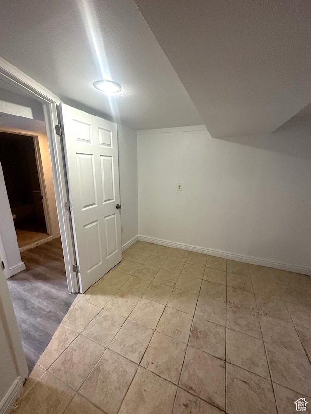 983 29th St, Ogden, UT 84403 - finished below grade area featuring baseboards and light tile patterned floors