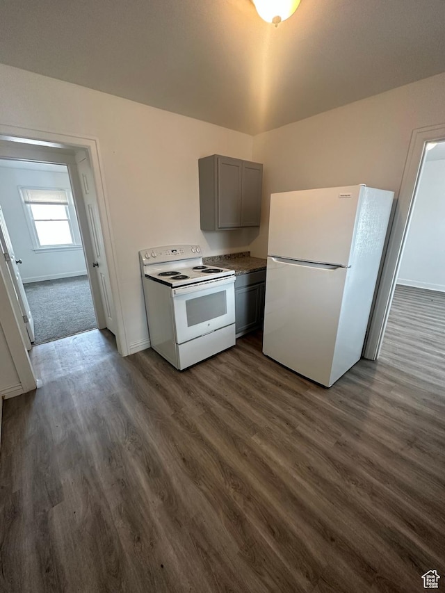 983 29th St, Ogden, UT 84403 - kitchen featuring white appliances, gray cabinets, and dark wood-style floors