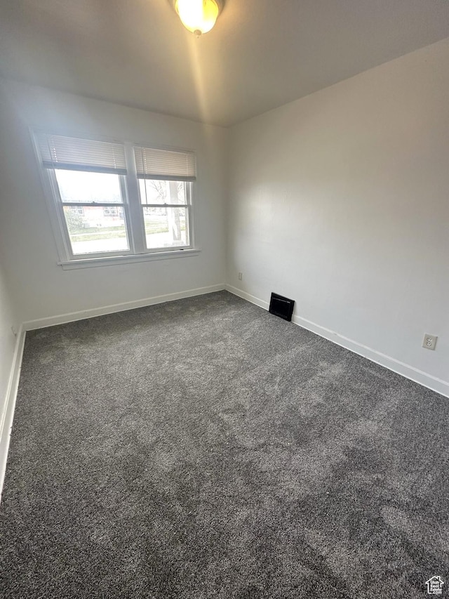 983 29th St, Ogden, UT 84403 - carpeted empty room with baseboards