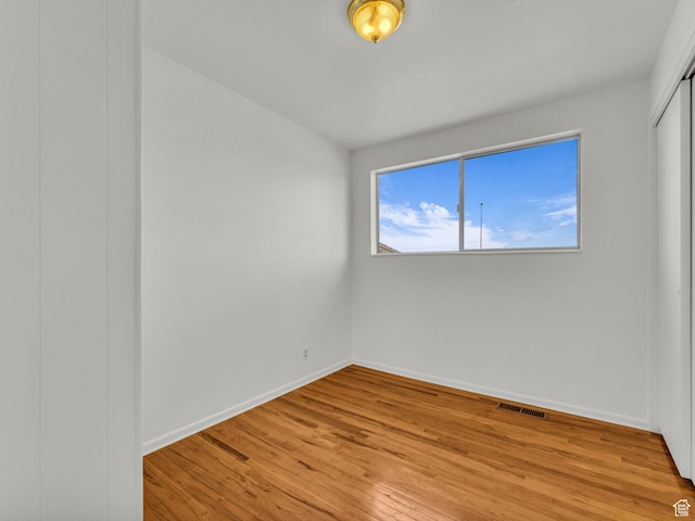 8323 S Adams St, Midvale, UT 84047 - spare room with light wood-type flooring and baseboards