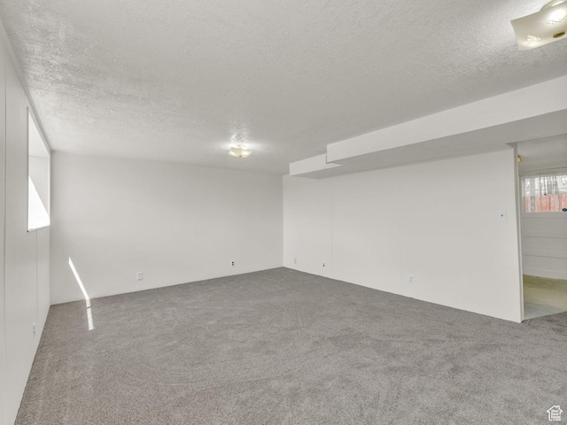 8323 S Adams St, Midvale, UT 84047 - empty room with a textured ceiling and carpet floors