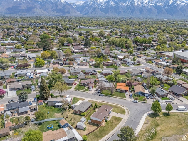 8323 S Adams St, Midvale, UT 84047 - aerial perspective of suburban area with a mountainous background