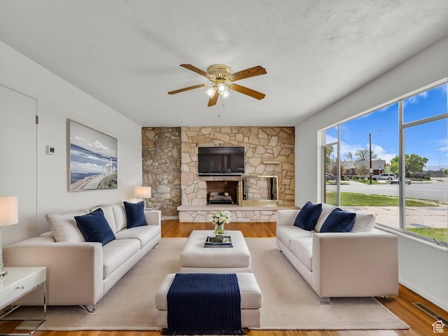 8323 S Adams St, Midvale, UT 84047 - living area with plenty of natural light, ceiling fan, and light wood-style flooring