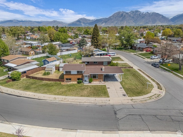 8323 S Adams St, Midvale, UT 84047 - aerial perspective of suburban area with a mountainous background