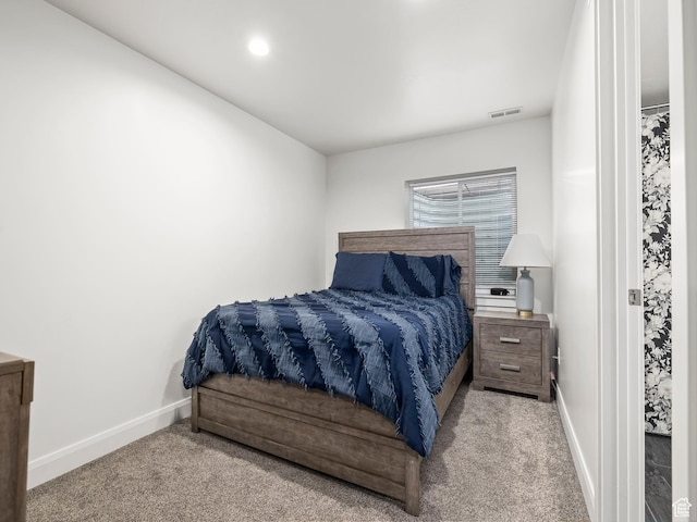 bedroom featuring visible vents, baseboards, recessed lighting, and carpet floors