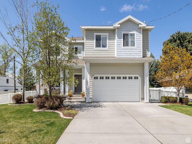traditional-style house featuring driveway, covered porch, a front yard, an attached garage, and fence