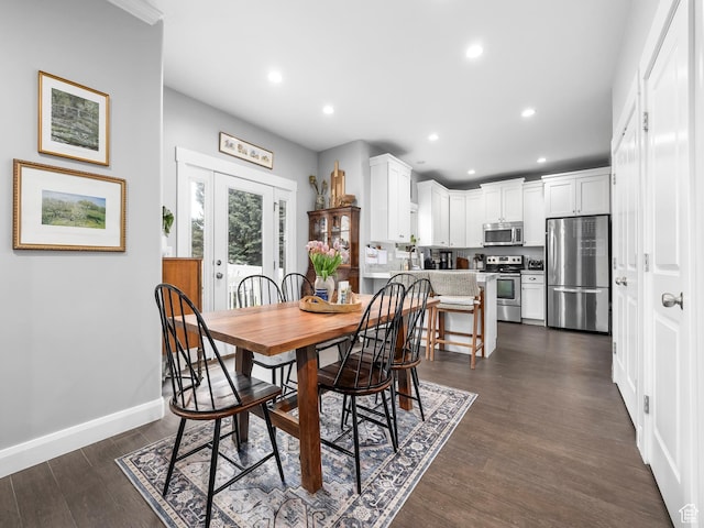 dining area with dark wood-style floors, recessed lighting, and baseboards
