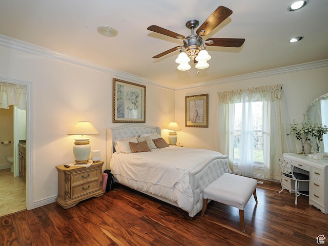 bedroom featuring crown molding and dark wood-style flooring