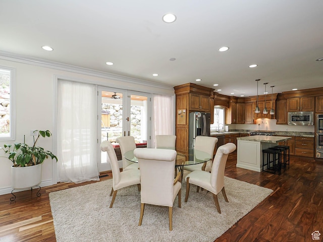 dining area featuring ornamental molding, recessed lighting, dark wood-style flooring, and french doors
