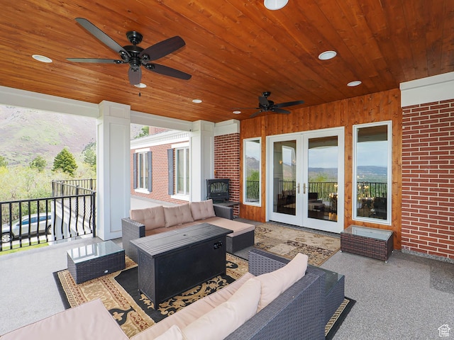 view of patio / terrace with a ceiling fan, french doors, and an outdoor hangout area