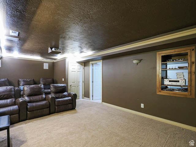 carpeted cinema featuring a textured ceiling and baseboards