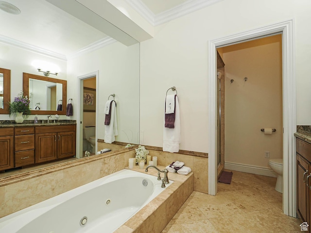 bathroom featuring a jetted tub, toilet, crown molding, and vanity